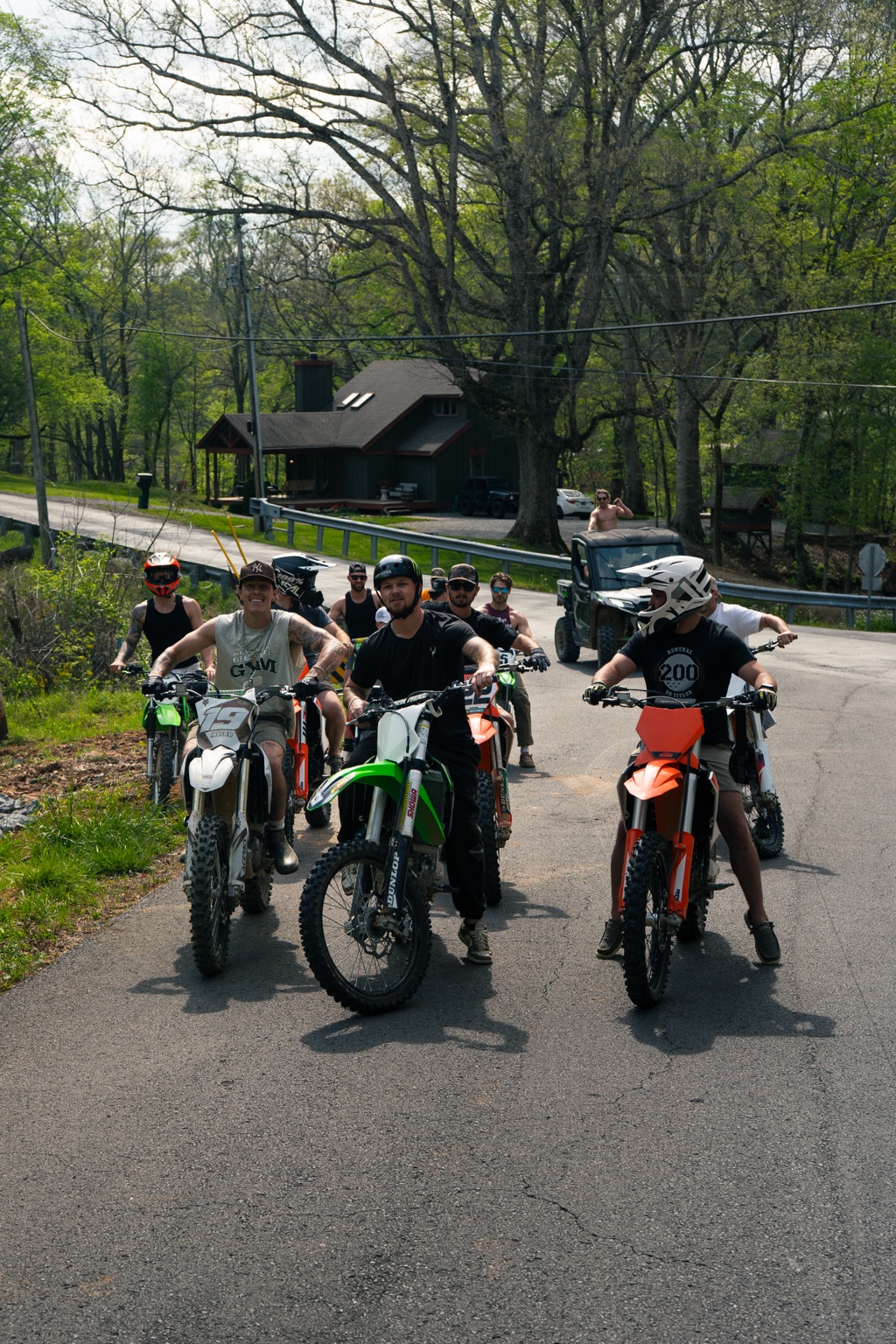 Dirt-bike group gathered on the road