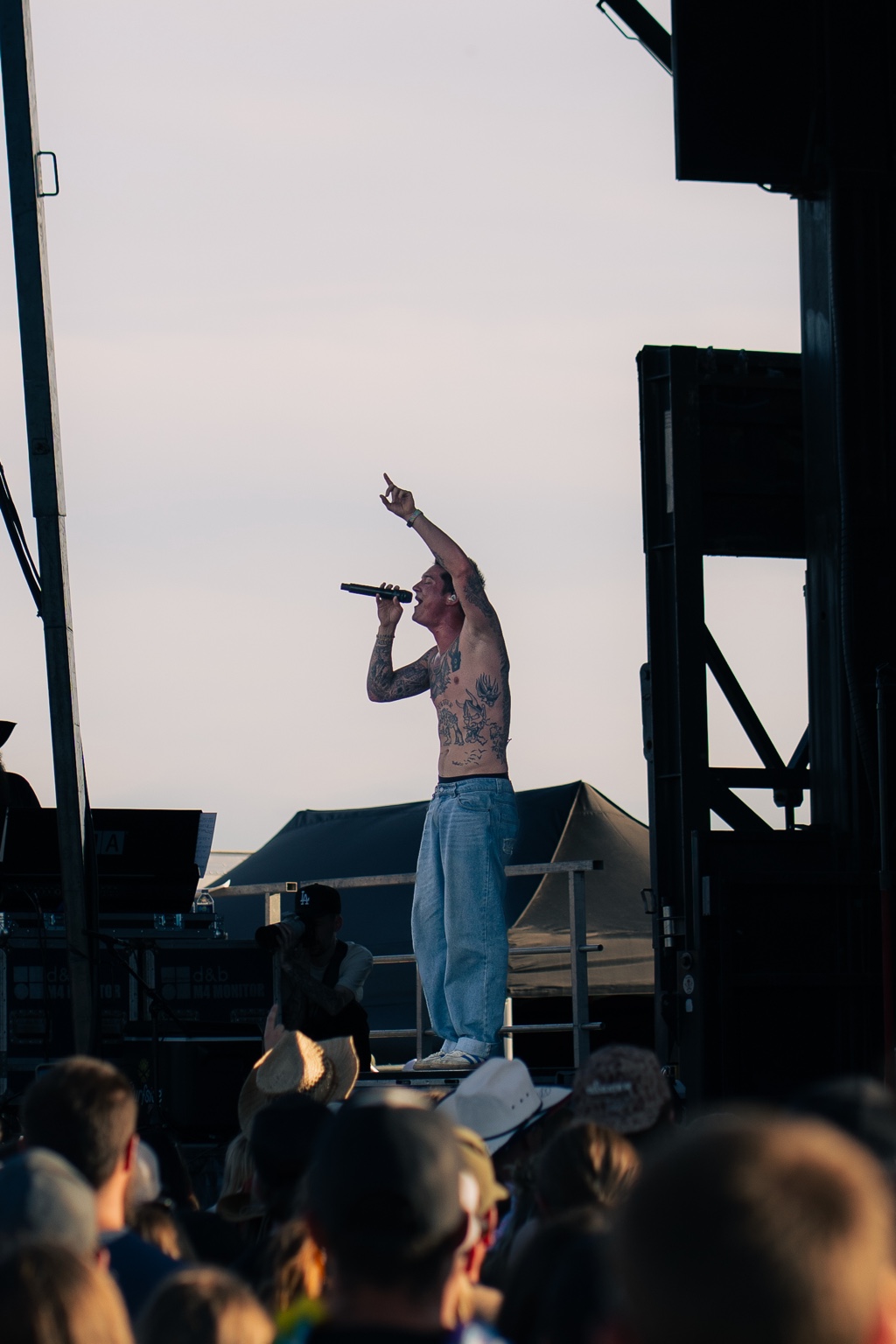 Artist performing on an outdoor stage