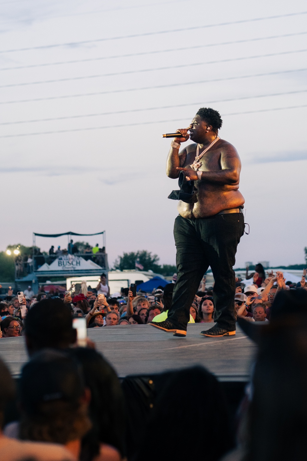 Artist performing on a festival runway