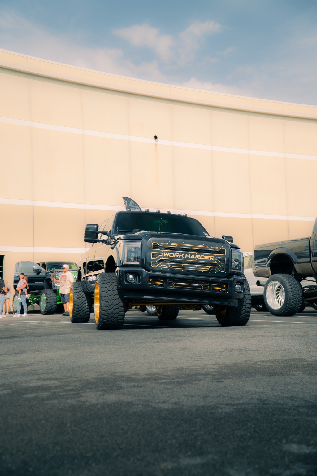 Black lifted truck at the show