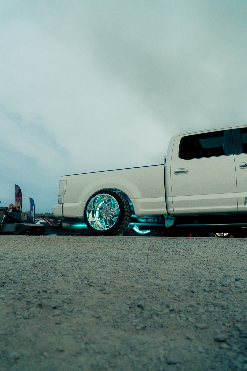 Truck with turquoise wheel lighting
