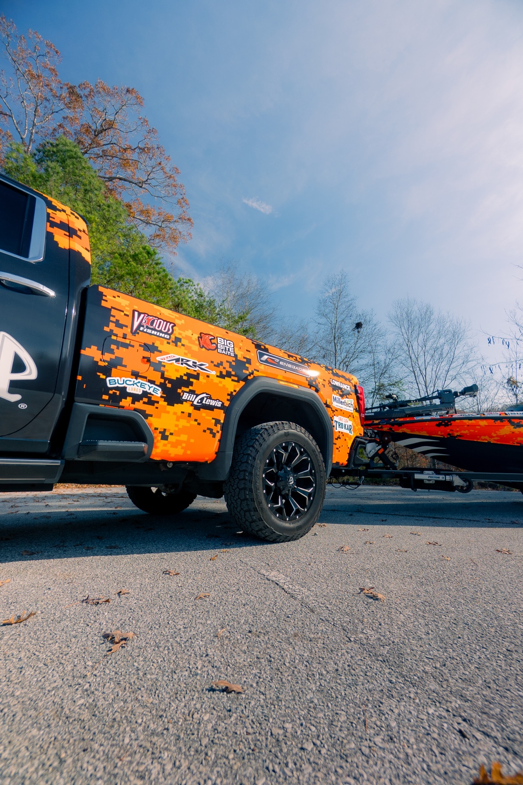 Orange branded truck photographed outdoors