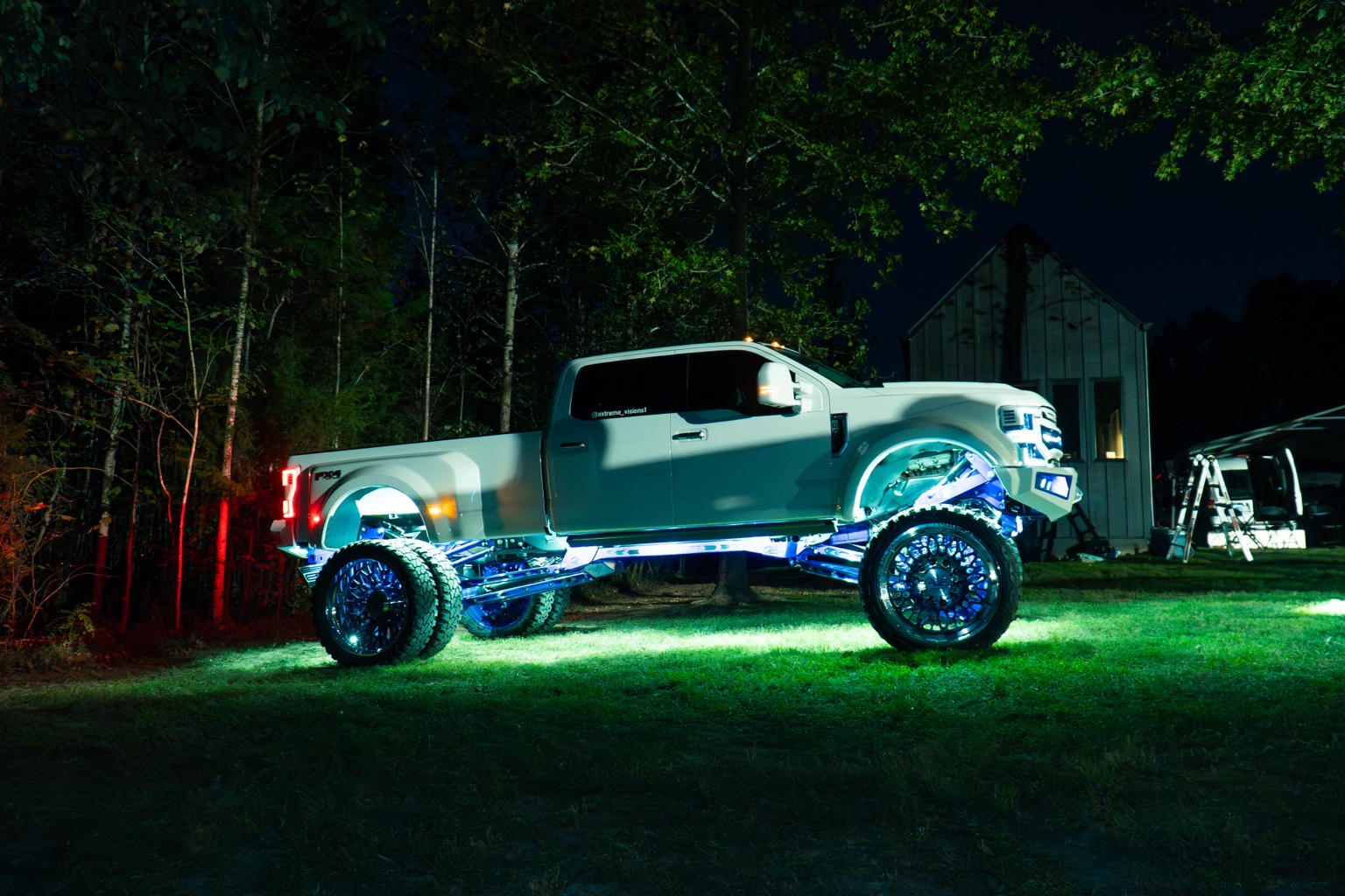 Custom truck illuminated after dark